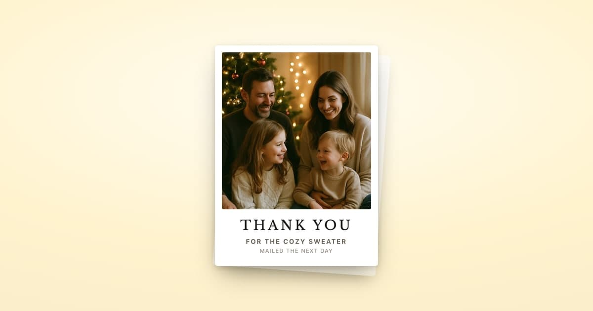 A ShipNote thank-you postcard with a family holiday photo above the words 'Thank you — for the cozy sweater, mailed the next day', stacked on a second card over a warm cream background